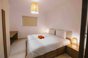 1 dormitorio, tabla de planchar con plancha, wifi gratis y ropa de cama