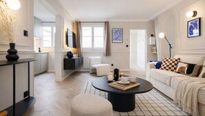 Apartemen Eksekutif | Area keluarga | TV layar datar