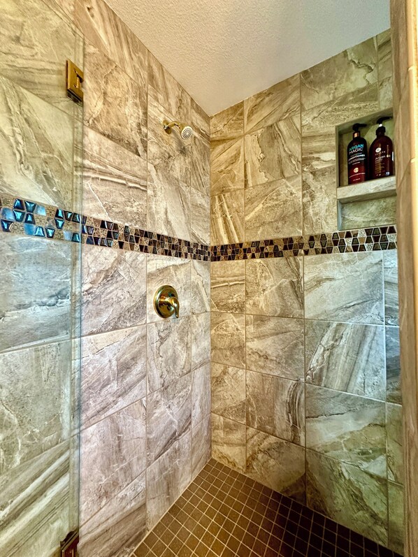 Shower, hair dryer, towels, soap