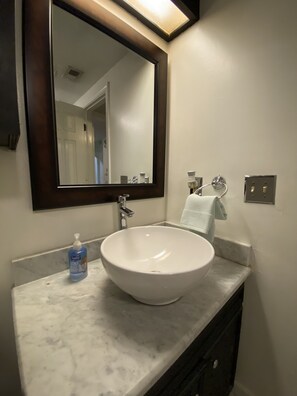 Hair dryer, towels, soap, shampoo