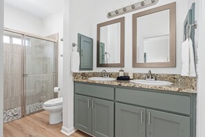 Shower, hair dryer, towels, soap - Rodeo Inn | Long Terms Welcome (Fredericksburg)