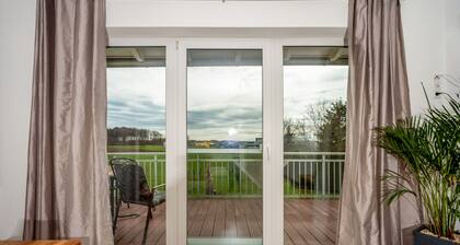 Apartment „Ferienwohnung 2“ mit Gemeinschaftsgarten, Balkon und WLAN