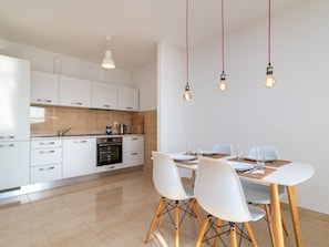 Fridge, oven, cookware/dishes/utensils