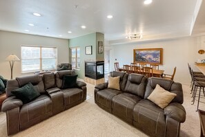 TV, fireplace - Comfortable mountain view condo with gas fireplace, W/D, & patio (Fraser)