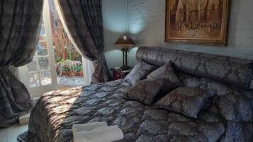 Premium bedding, down duvets, Select Comfort beds, in-room safe