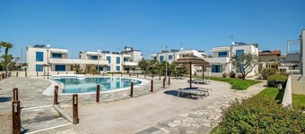 Apartment 'Blu Village' with Shared Pool, Private Terrace and Air Conditioning