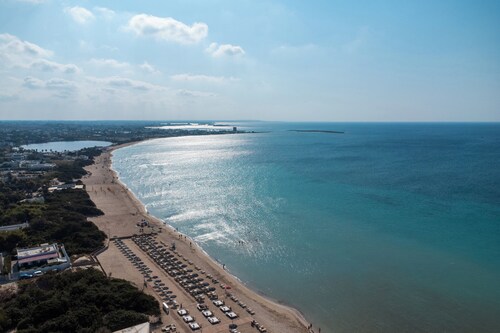 Villa 'Letizia Baia Del Sol' mit privater Terrasse und Klimaanlage