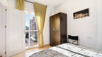 2 dormitorios, tabla de planchar con plancha, wifi gratis y ropa de cama