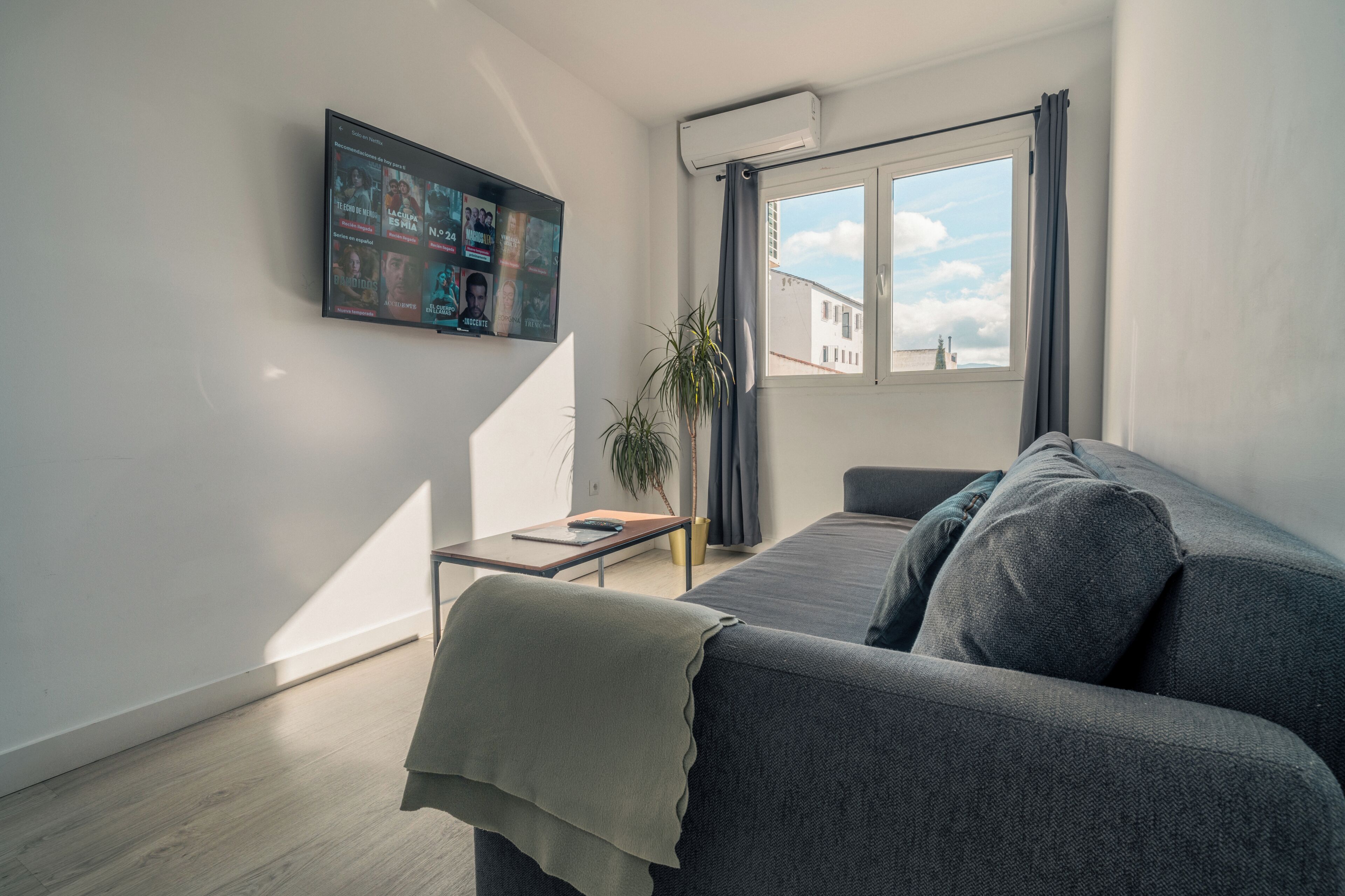 Apartment | Living area | 50-inch plasma TV with cable channels, Netflix, streaming services