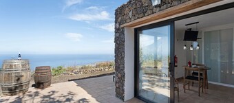 Maison de vacances 'Apartamento El Moral' avec vue sur la mer, terrasse privée et Wi-Fi