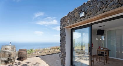 Maison de vacances 'Apartamento El Moral' avec vue sur la mer, terrasse privée et Wi-Fi