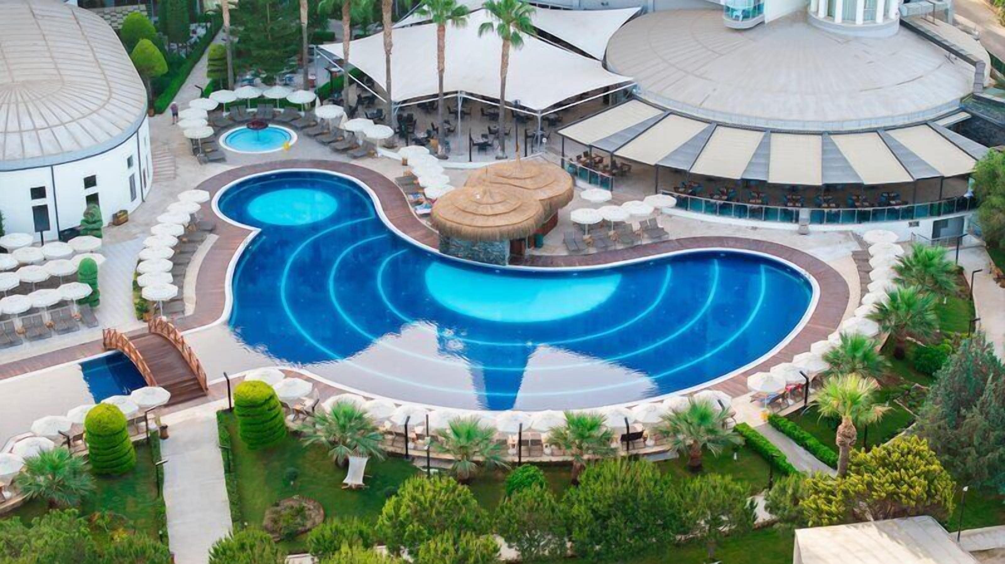 Indoor pool, seasonal outdoor pool, pool umbrellas, sun loungers