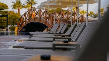 Indoor pool, seasonal outdoor pool, pool umbrellas, sun loungers