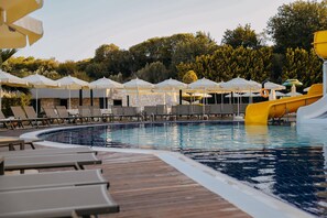 Indoor pool, seasonal outdoor pool, pool umbrellas, pool loungers