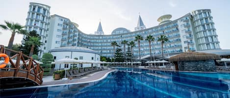 Indoor pool, seasonal outdoor pool, pool umbrellas, pool loungers