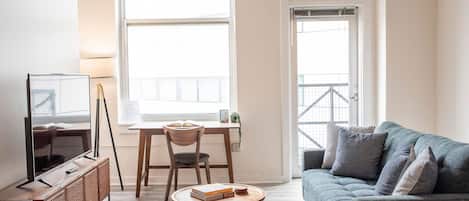 Executive Apartment | Living area | TV