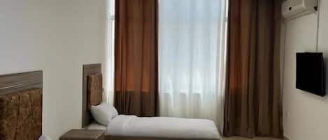 Egyptian cotton sheets, premium bedding, desk, laptop workspace