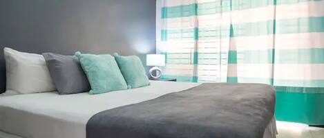 Premium bedding, pillowtop beds, individually furnished, blackout drapes