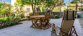 Very comfortable apartment with a beautiful garden in the center of Bagnoregio.