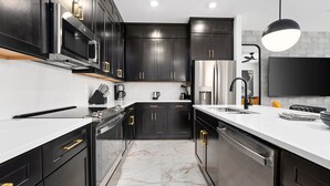 Private kitchen - Harper's Harbor | Tranquil NEW villa w/ PVT pool, luxe BRs, near airport & parks (Orlando)