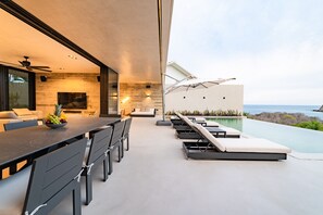 Outdoor dining - Luxury Oceanfront Villa w/ Pools & Elevator (Huatulco)