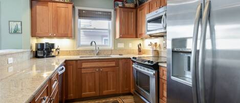 Fridge, stovetop, coffee/tea maker, toaster