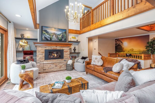 Älytelevisio, takka, videopelejä, pöytäjalkapallopöytä