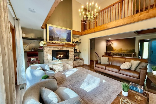 Inviting and cozy living room, mural from local photographer