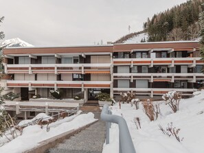 Stunning mountain views from balconies with a covered entrance area.