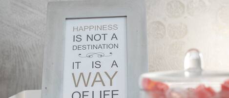 A framed quote on a wall.