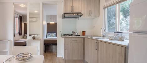 Fridge, stovetop, coffee/tea maker, high chair