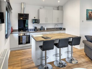 Dishwasher, high chair, cookware/dishes/utensils