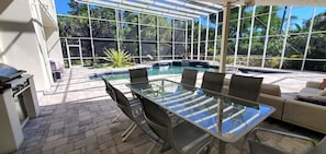 Enjoy a dining experience with a clear view of the lush surroundings.