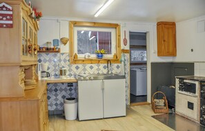 Frigorífic, placa de cuina i cafetera i tetera 
