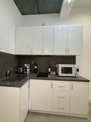Microwave, oven, electric kettle, cookware/dishes/utensils