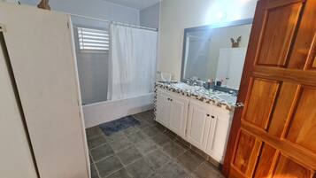 Hair dryer, towels, soap, shampoo