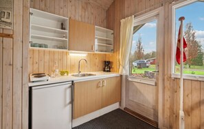 Fridge, coffee/tea maker, cookware/dishes/utensils