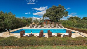 A pool area with lounge chairs and a pergola. - Stunning home in Liznjan with sauna (Liznjan)