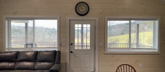 Family friendly cottage, covered deck, close to lake to fish, swim, and boat