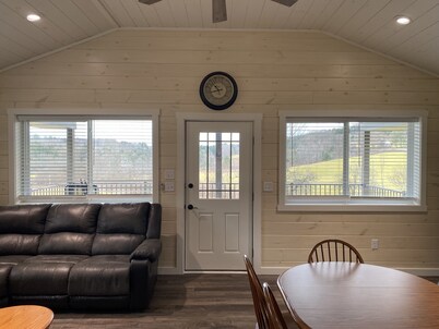 Family friendly cottage, covered deck, close to lake to fish, swim, and boat