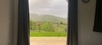 Commune with Nature at Hilltop View in Nikau Valley!