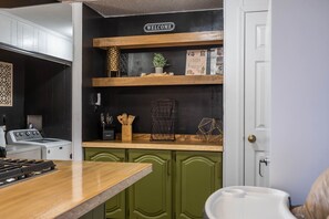 Fridge, microwave, stovetop, coffee/tea maker