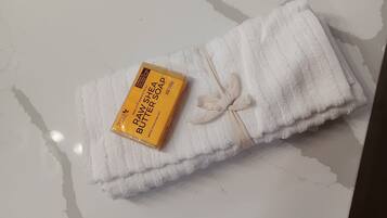 Hair dryer, towels, soap, toilet paper