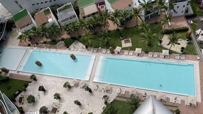 Outdoor pool, a heated pool - Best view  and location at ICON Vallarta.10 min from airport and 15 min downtown (Puerto Vallarta)