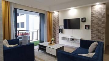 商务公寓 | 起居区 | 24-英寸智能电视(配备卫星频道)
