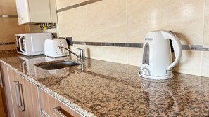 Fridge, microwave, oven, coffee/tea maker