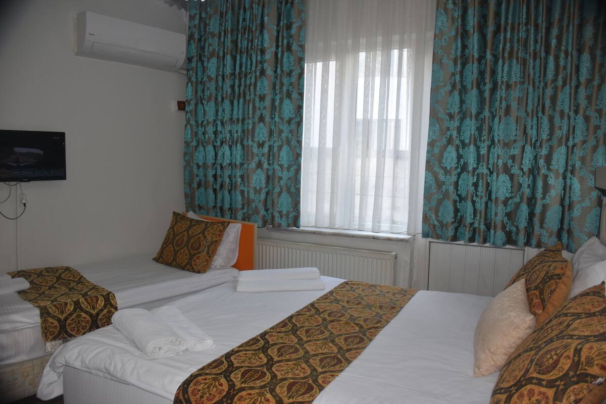 Habitación básica con 1 cama matrimonial o 2 individuales