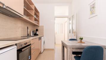 Classic Apartment | Private kitchen | Mini-fridge, stovetop, dishwasher, coffee/tea maker