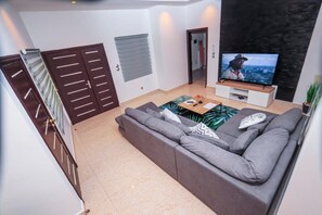 Design Apartment, 2 Bedrooms, Balcony | Living room | Flat-screen TV