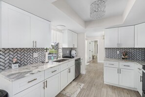 Fridge, microwave, oven, stovetop - 3/2 Heated Pool Home in SE Cape! (Cape Coral)